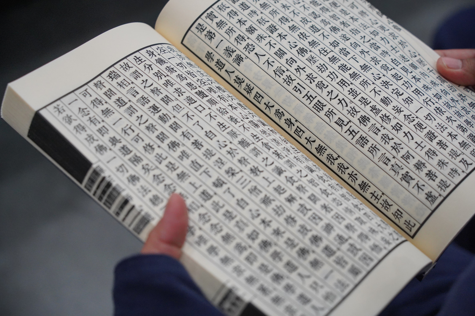 Buddhist scriptures being read